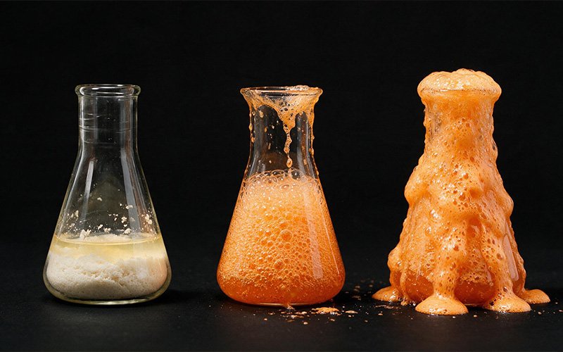 chemical-foam-overflowing-from-glass-flask-during-a-violent-reaction